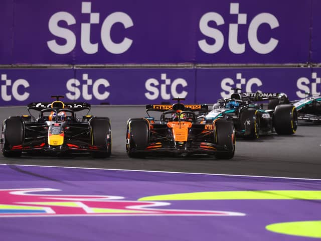 Verstappen ran off the track to pass Piastri at the first corner in Jeddah