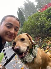 Rebecca McBride, chaperoning a dog.