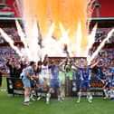 Oldham Athletic beat Southend at Wembley to return to the Football League