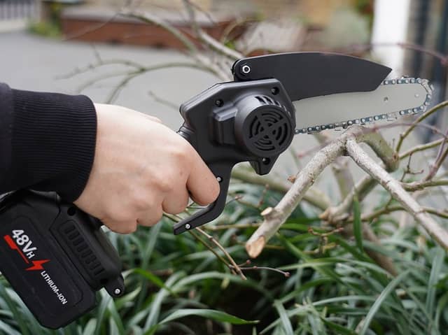 The Timber Titan 6-Inch Mini Chainsaw: for real men only.