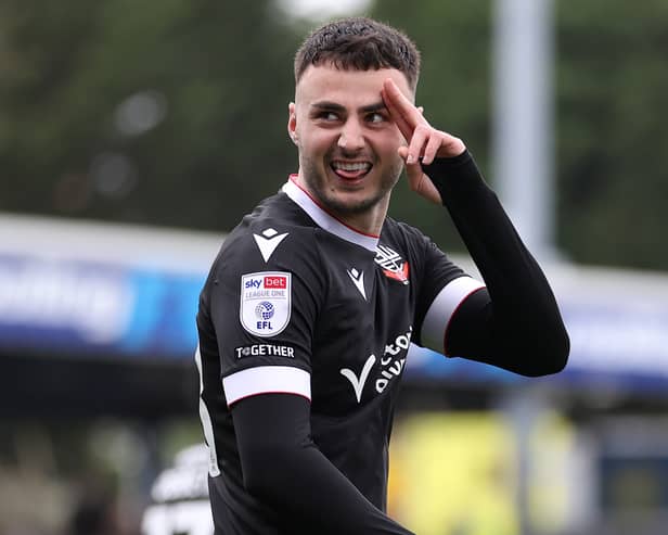 The MK Dons striker has set his sights high, aiming for the League Two golden boot next season