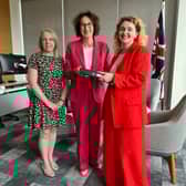 Myself and Laura Collins (Publisher, Worlds Division, National World), handing over the folder containing over 400 anonymous responses to our Endo the Battle survey to Baroness Merron, Minister for Patient Safety, Women's Health and Mental Health.