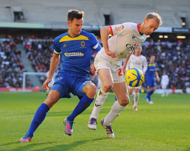 Luke Chadwick played in the first game between MK Dons and AFC Wimbledon