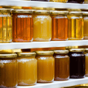 A wide range of honey jars on UK shelves – but nearly half could be adulterated with sugar syrup, according to EU tests