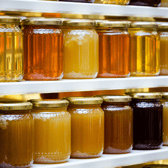 A wide range of honey jars on UK shelves – but nearly half could be adulterated with sugar syrup, according to EU tests