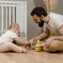Talking, singing, or playing simple games like peekaboo with your babies can help support their development.