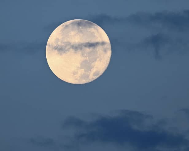 A sturgeon super moon sets in Las Vegas, Nevada, in 2023