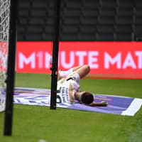 Collins broke his arm and played on in Dons' opening day draw