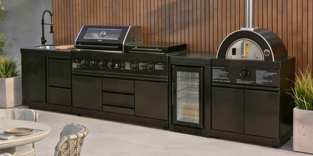 Royalcraft’s Luxe Outdoor Kitchen combines a seven-burner BBQ, pizza oven, sink and fridge in a fully integrated setup designed for serious outdoor entertaining.