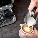 The Ninja Luxe Café Premier Espresso Machine in grey is designed to make espresso, cappuccinos and lattes with automated brewing features.
