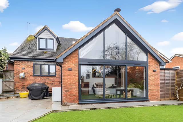 Set back from the road, the property makes a strong first impression with generous parking and attractive landscaped frontage.