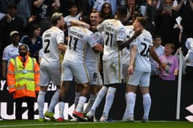 MK Dons celebrated promotion last season and they want to do it again in League One