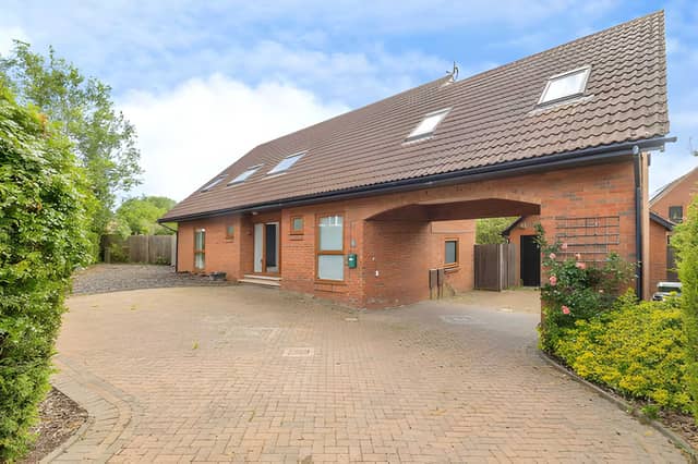 The detached Gibsons Green home is set on a sizeable plot with ample parking, a carport and double garage