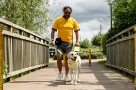 Sha from Milton Keynes with guide dog Moby.