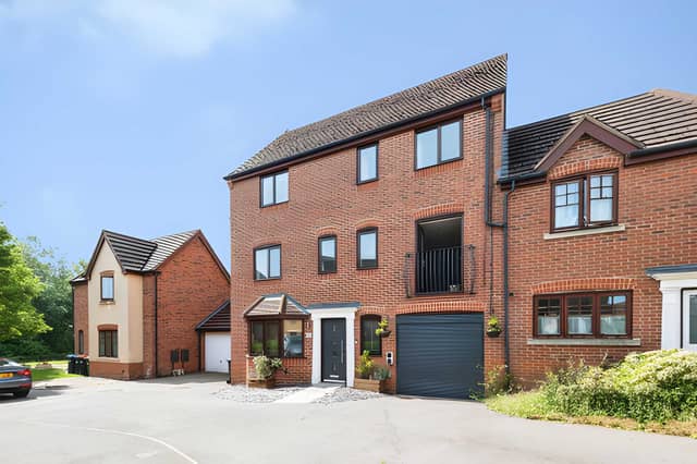 The quiet tucked-away setting of this Westcroft semi-detached home complements its generous three-floor family accommodation