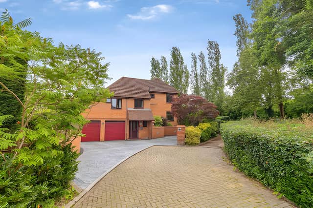 Tucked away at the end of a cul-de-sac, the detached Bernay Gardens property has ample parking and a garage