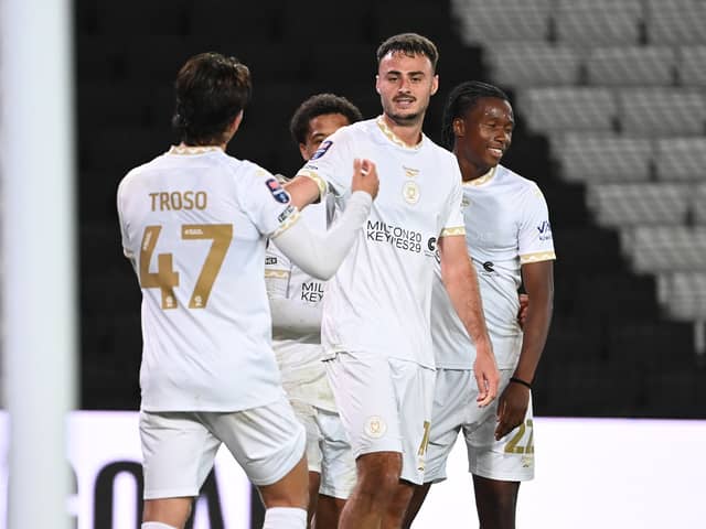 Aaron Collins scored twice in first-half stoppage time