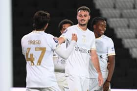 Aaron Collins scored twice in first-half stoppage time