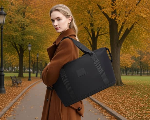 The Kono expandable cabin bag features a separate cosmetic pouch, wet pocket and trolley strap.