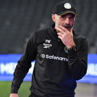 Warne backed by ex-Dons boss to get the club out of trouble