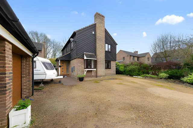 The detached house sits in an established residential setting in Great Linford, Milton Keynes.
