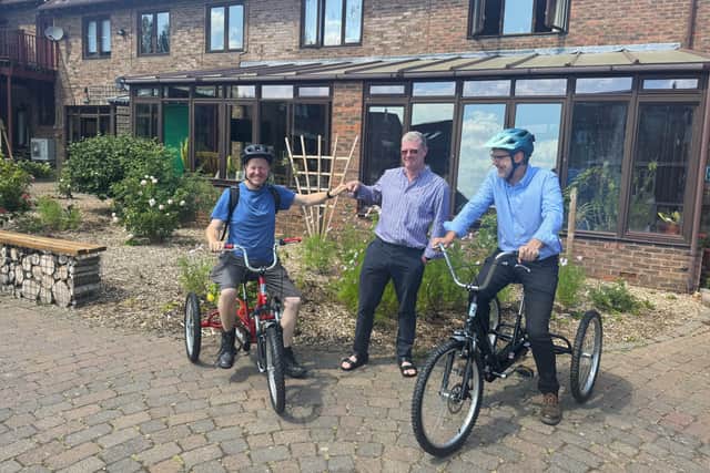 Tim Davies (CEO Camphill MK), Matthew Downton (Director ICAEW), and Matthew Fisher (Resident at Camphill MK) on the new trikes
