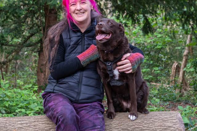 Artist Becky Gouverneur with her dog, Zelda, who also features in her new book. A lifelong animal lover, Becky specialises in realistic charcoal animal portraits.