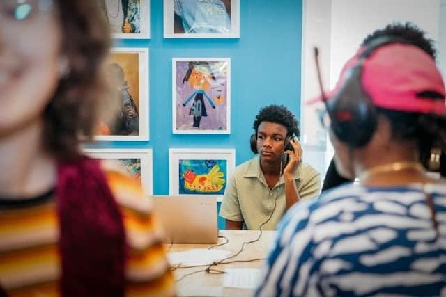 Young people listening to audiobooks