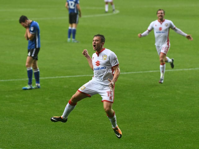 Ryan Seager celebrates his stoppage-time winner against Rochdale