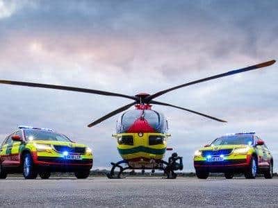 The air ambulance and two of the crew's emergency vehicles