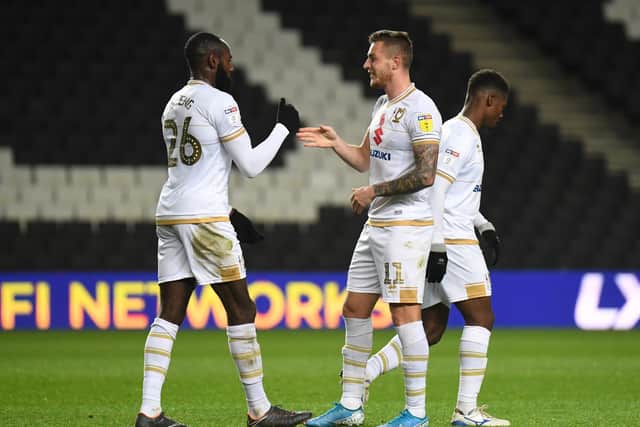 Brennan Dickenson celebrates his first goal for MK Dons