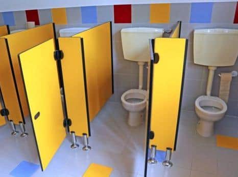Unisex toilets are popular with students, says the head teacher