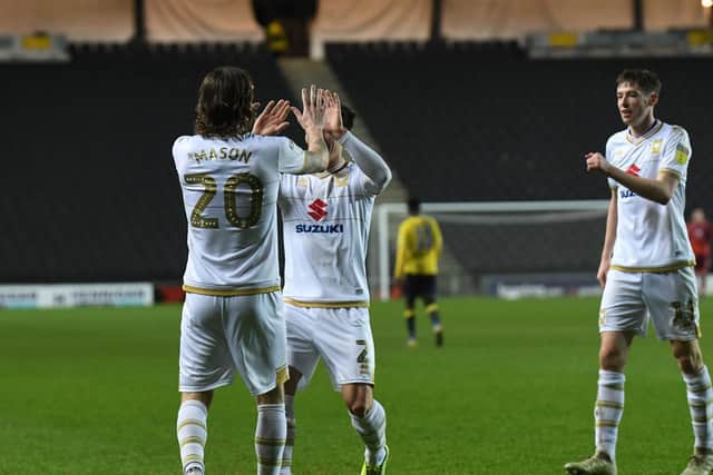 Mason celebrates his goal against Coventry with George Williams and Conor McGrandles