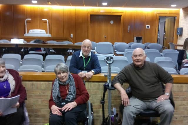 Disabled campaigners (front row) Chris Checkley, Valerie Williamson, and Ernie Boddington. Councillor Paul Alexander is behind them.