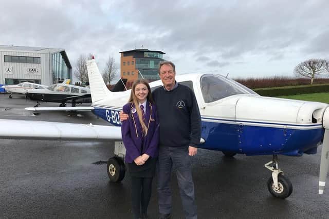 Tegan flew the plane in her school uniform because she had to go straight back to lessons afterwards.