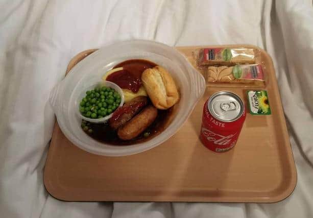 Meals are left on a tray outside guests' doors