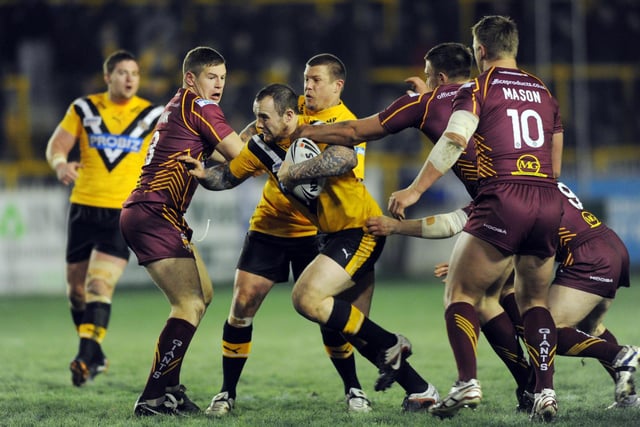 Action from Castleford Tigers' pre-season match against Huddersfield Giants, which featured in the January 19, 2012 edition of the Pontefract & Castleford Express. A young Nathan Massey drives forward in the 32-22 victory for the Tigers.