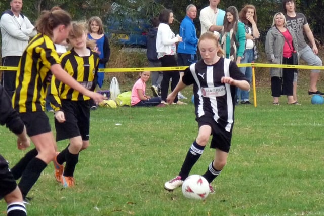 Castleford White Rose Girls U12s went top of Division One of the West Riding Girls League with a 7-0 win over Guiseley U12s, with Chelsea Schofield, pictured, taking her tally to 46 goals for the season.