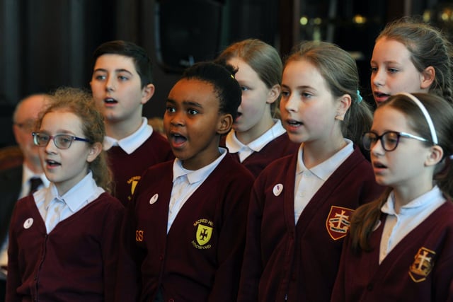 Pupils from Sacred Heart RC Primary School, Leigh, sang and did readings in the ceremony at Leigh Town Hall.