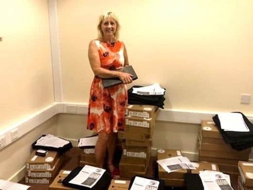 Milton Keynes Cllr Zoe Nolan taking delivery of the first batch of new laptops