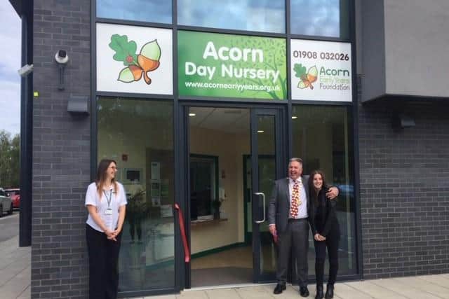 Mayor Andrew Geary and his daughter Rebekah open the new nursery