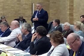 Cllr Terry Baines speaking at a meeting of the council before lockdown