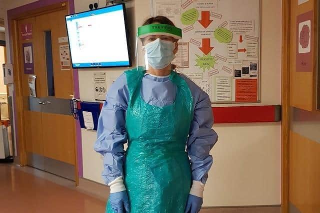 Nurse Leona Harris at work in her PPE