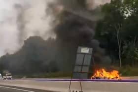 Dashcam footage shows the blazing vehicle on the M1