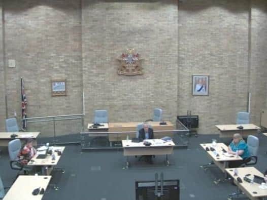 Only a few council officers and chairman David Hopkins were at the council chamber as the meeting was held virtually