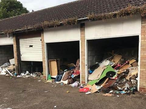 Nearby garages are full of rubbish and a rats' paradise