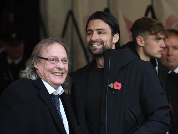 Chairman Pete Winkelman and Russell Martin