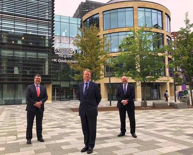 Iain Stewart (left) with Alister Jack and David Duguid outside the new offices