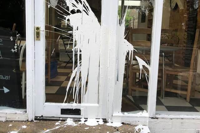 Paint was thrown at the doors