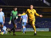 Carlton Morris scored on his Dons debut against Coventry last season